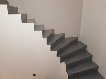 Exemple d'un escalier en béton décoratif 